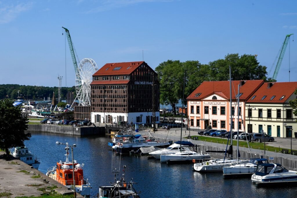Klaipėda waterfront with Old Mill Hotel and yachts along the canal