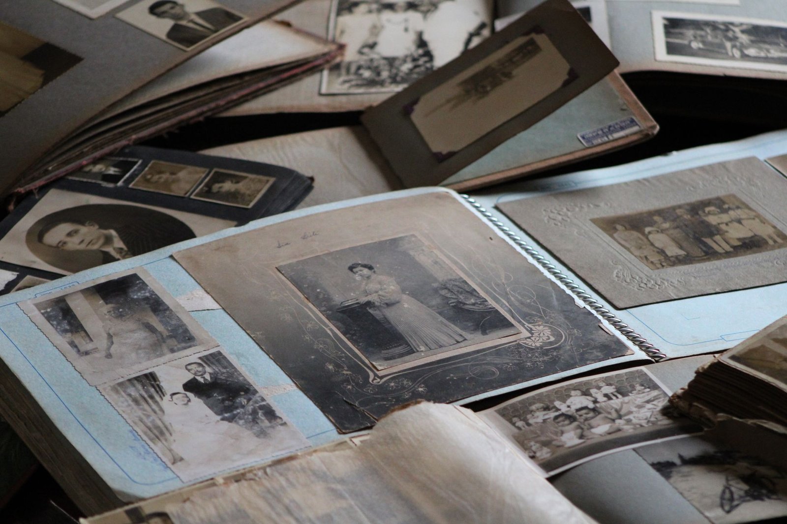 An old family photo album with black and white photographs