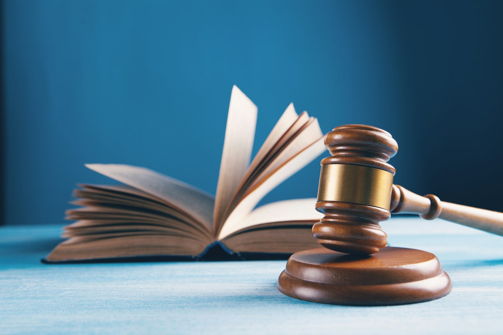 Judge's gavel and open law book – citizenship legislation